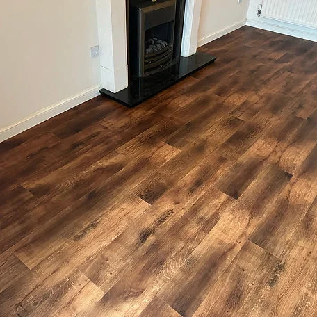 A room featuring wood flooring installed by Carpet and Vinyl in the Cotswolds and Southwest