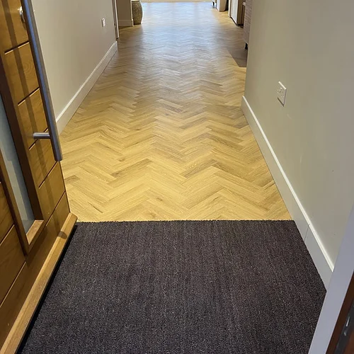 A hallway featuring Flooring installed by Carpet and Vinyl in the Cotswolds and Southwest